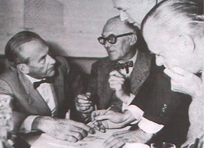 "Wohnmaschine" (Unité d'Habitation), 2002, installation, projection 3:
  'Architects, didactic material' / 'Architekten, Didaktisches',
  video: reproduced photographs (Kirsten Kötter)